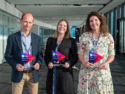 Type 1 Diabetes Grand Challenge Research Fellows stood in group holding their awards