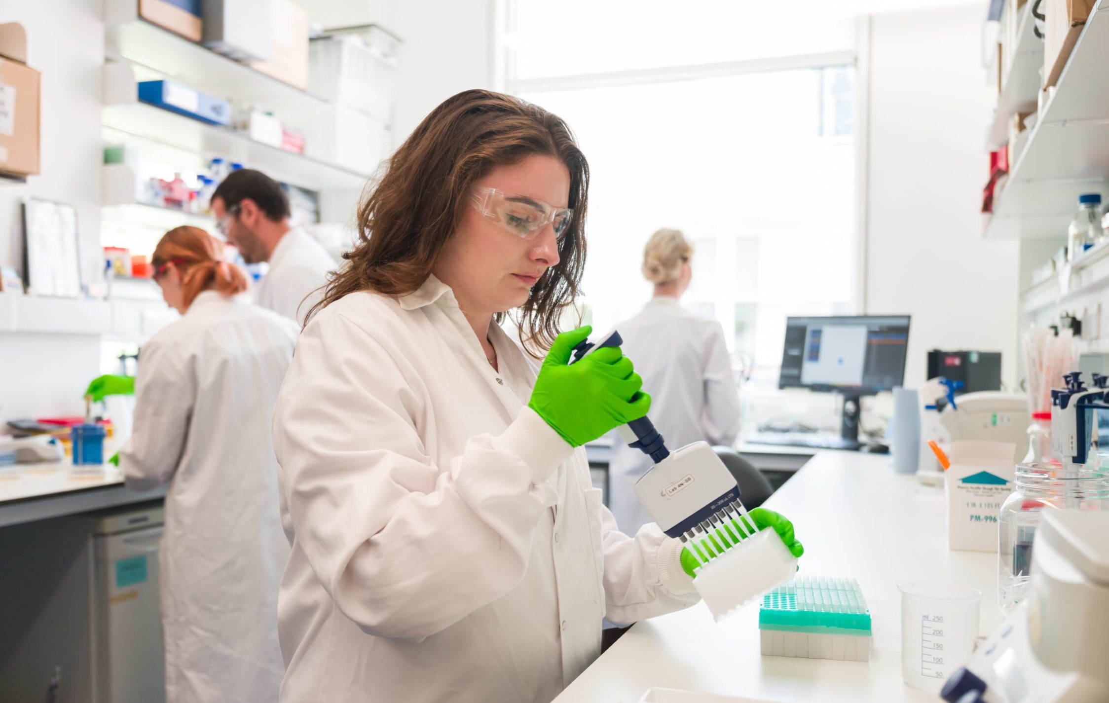 Grand Challenge researcher working in a lab setting